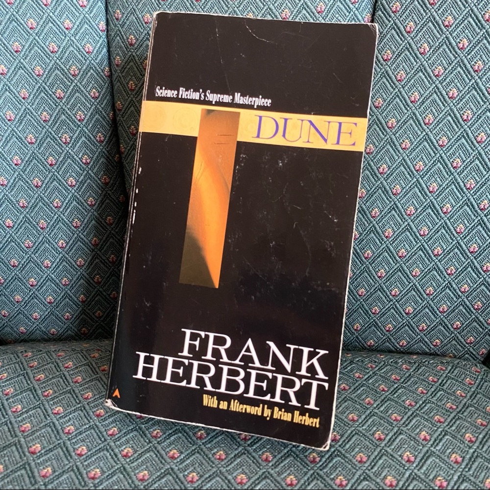 Dune Paperback Novel by Frank Herbert. Science Fictions Supreme Masterpiece!